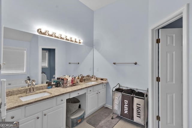 1885 Hickory Station Cir, Snellville, GA 30078 - full bath featuring double vanity and tile patterned floors