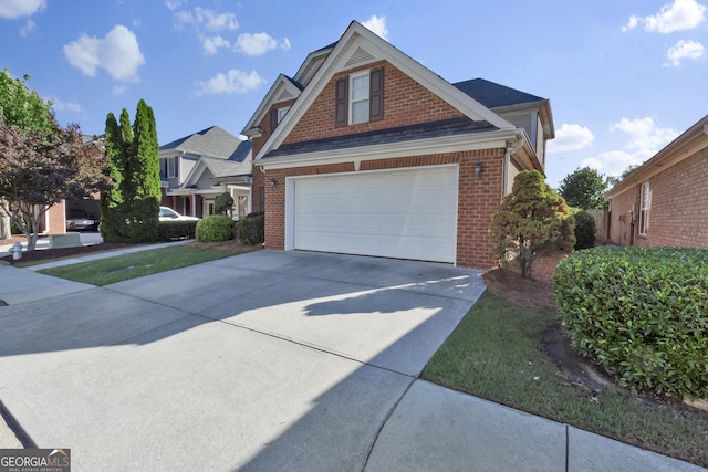 1885 Hickory Station Cir, Snellville, GA 30078 - view of front facade with brick siding and driveway