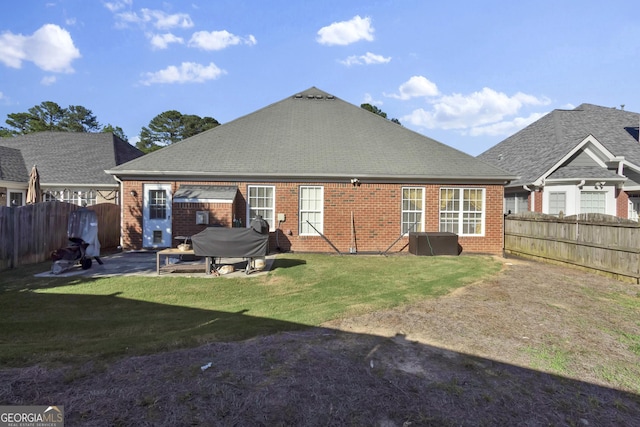 1885 Hickory Station Cir, Snellville, GA 30078 - back of house with brick siding, a patio, and a shingled roof