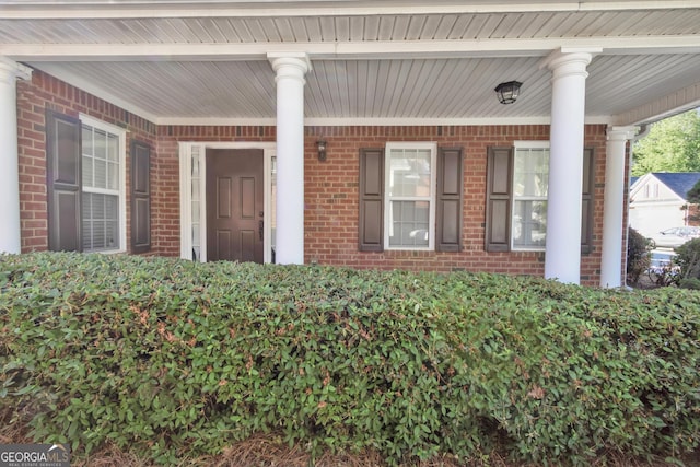 1885 Hickory Station Cir, Snellville, GA 30078 - view of exterior entry with brick siding and covered porch