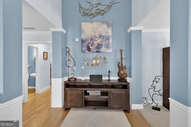 1885 Hickory Station Cir, Snellville, GA 30078 - office area with light wood-style flooring, baseboards, and ornate columns