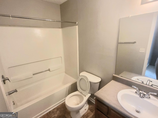 full bathroom with shower / washtub combination, toilet, and vanity