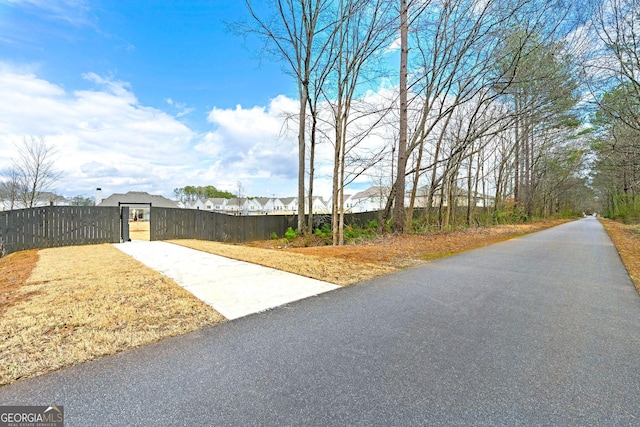 3610 Silvery Way, Powder Springs, GA 30127 - view of asphalt road with a gate