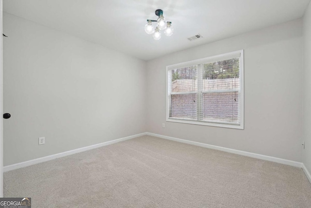 1736 Dylan Pl, Lawrenceville, GA 30043 - carpeted spare room with baseboards