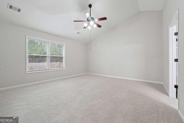 1736 Dylan Pl, Lawrenceville, GA 30043 - unfurnished room featuring vaulted ceiling, light colored carpet, and a ceiling fan