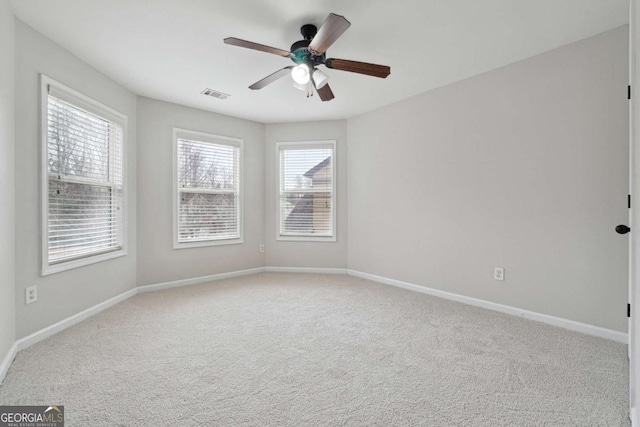 1736 Dylan Pl, Lawrenceville, GA 30043 - unfurnished room with carpet floors and ceiling fan