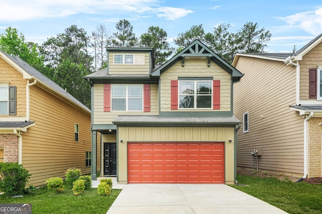 craftsman inspired home featuring board and batten siding, an attached garage, and concrete driveway