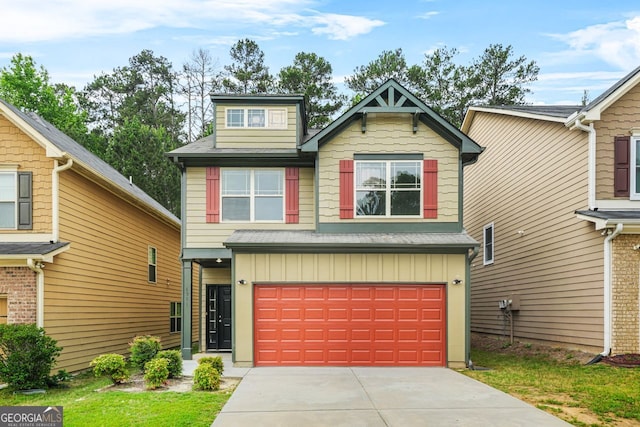 craftsman-style house with board and batten siding, a garage, and driveway