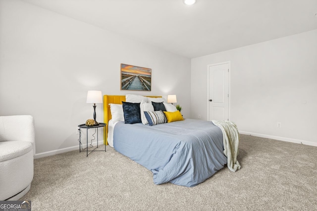 carpeted bedroom with baseboards