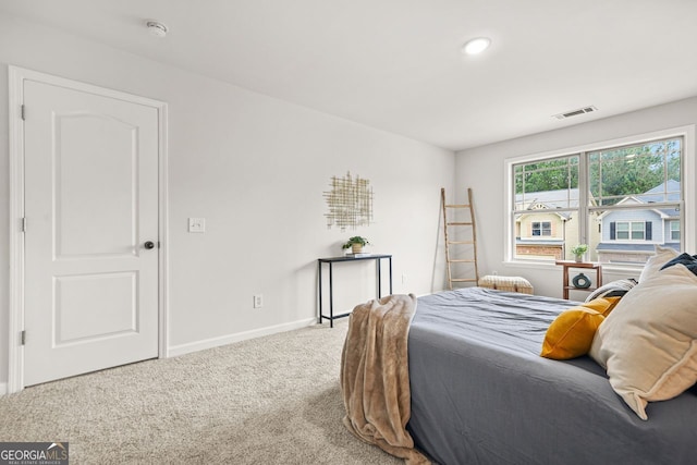 bedroom with carpet flooring, baseboards, and recessed lighting