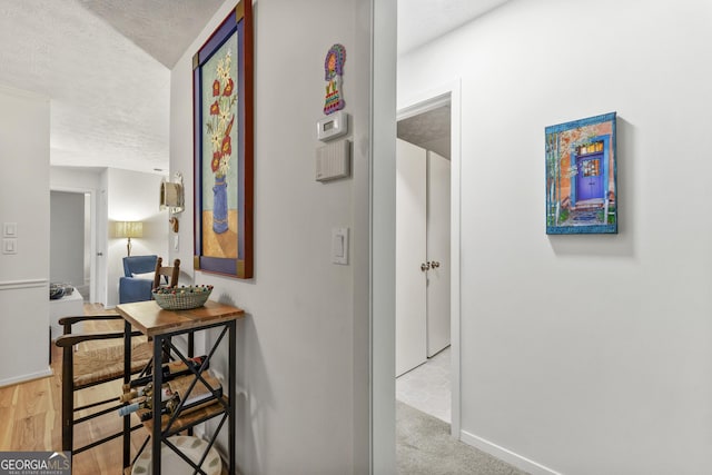 1424 Tuxworth Cir, Decatur, GA 30033 - corridor featuring a textured ceiling and baseboards