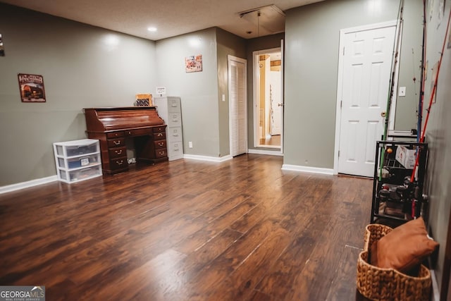 living room featuring wood finished floors, baseboards, and recessed lighting