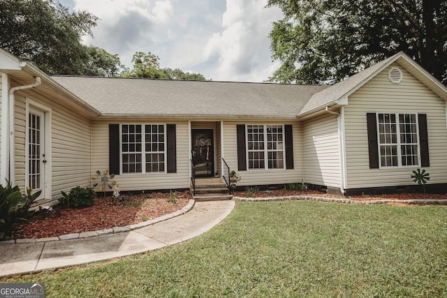 single story home with crawl space, a front yard, and roof with shingles