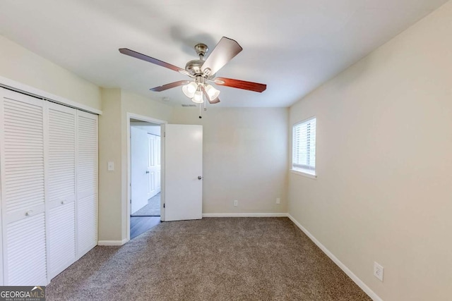 3197 Ward Dr SW, Atlanta, GA 30354 - unfurnished bedroom featuring carpet flooring, a closet, baseboards, and ceiling fan