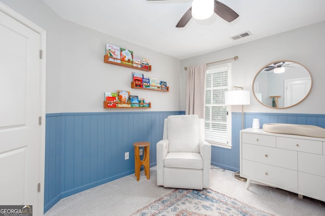 855 Mountain View Ter NW, Marietta, GA 30064 - living area with ceiling fan, a wainscoted wall, and carpet