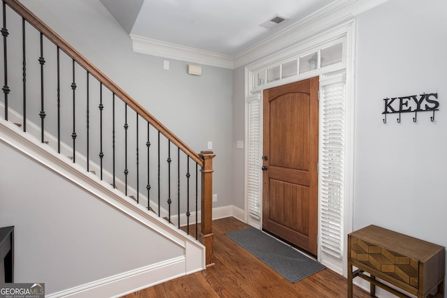 855 Mountain View Ter NW, Marietta, GA 30064 - entrance foyer with wood finished floors, stairs, ornamental molding, and baseboards