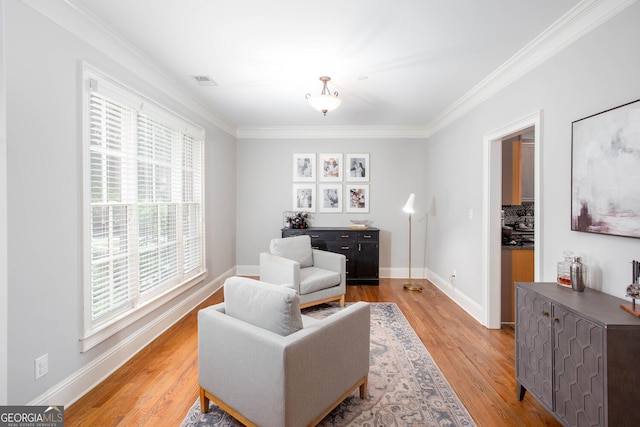855 Mountain View Ter NW, Marietta, GA 30064 - sitting room featuring ornamental molding, light wood-style flooring, and baseboards