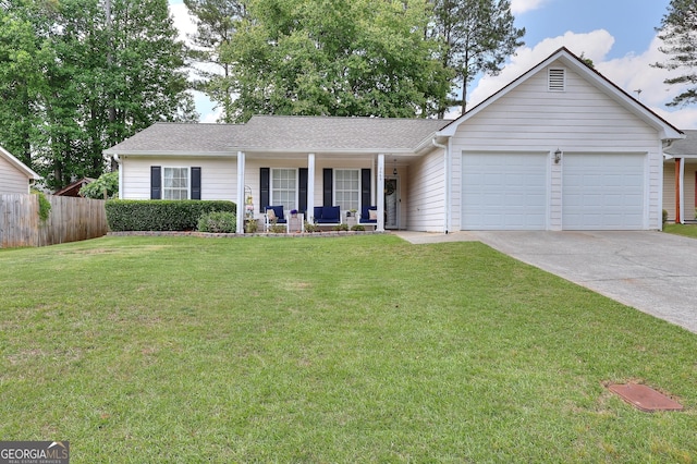 ranch-style house featuring covered porch, an attached garage, driveway, and a shingled roof