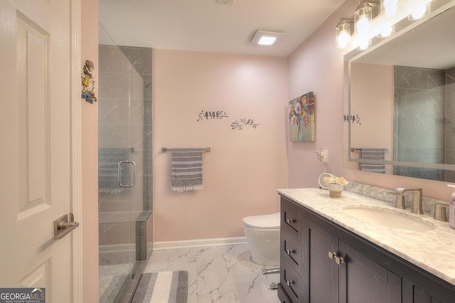 bathroom with marble look tiles, a stall shower, vanity, toilet, and baseboards