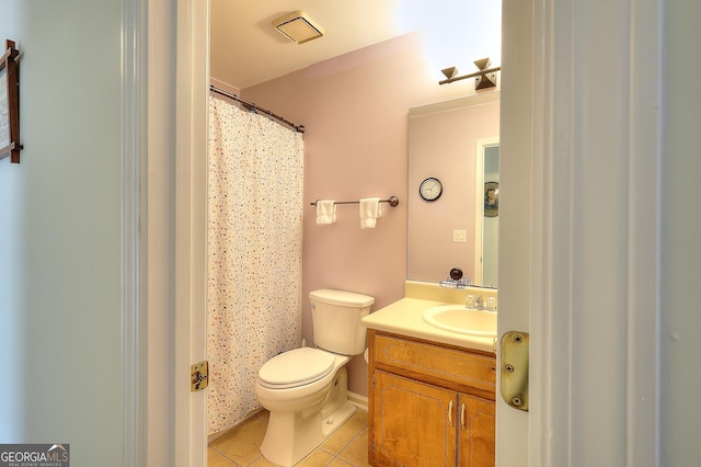 full bathroom with tile patterned floors, toilet, vanity, and a shower with curtain