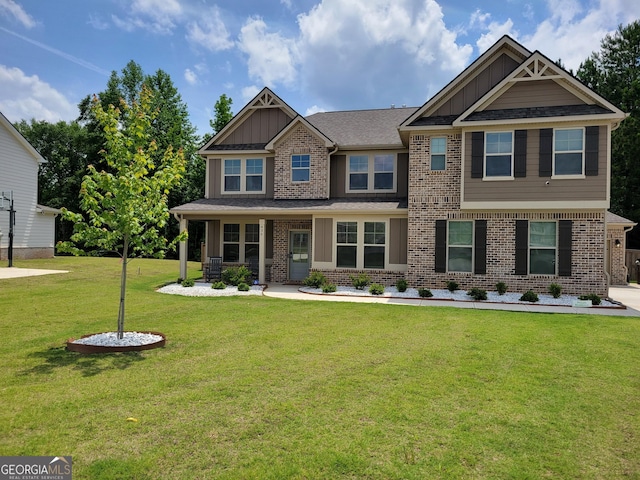 436 Lothbury Ave, Locust Grove, GA 30248 - craftsman house with board and batten siding, brick siding, and a front yard