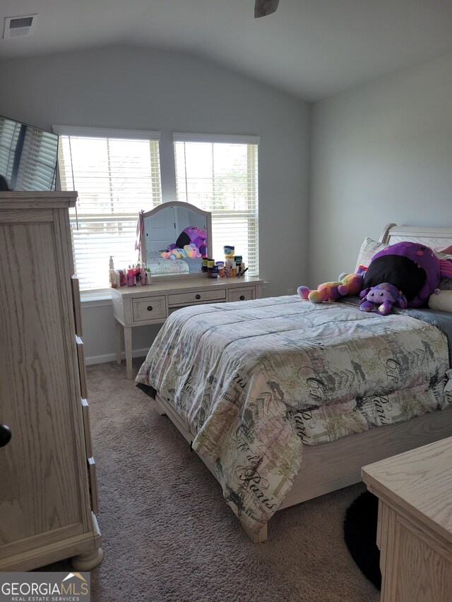 436 Lothbury Ave, Locust Grove, GA 30248 - bedroom with lofted ceiling, light colored carpet, and baseboards
