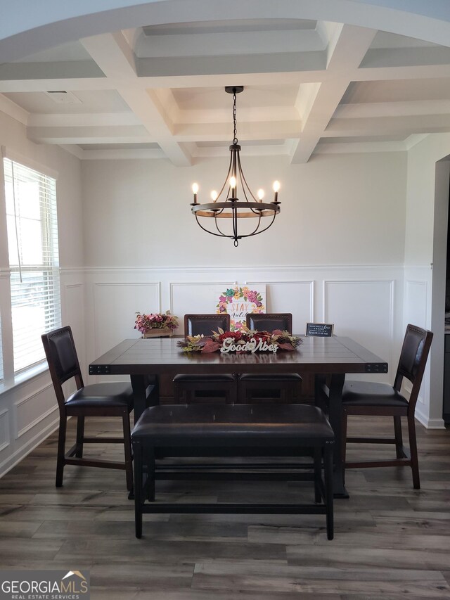 436 Lothbury Ave, Locust Grove, GA 30248 - dining space featuring a decorative wall, coffered ceiling, a chandelier, beamed ceiling, and dark wood-type flooring
