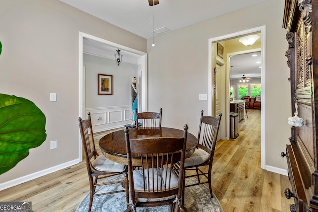 733 Firefly Ct, Griffin, GA 30223 - dining room with ceiling fan, light wood-style flooring, and baseboards