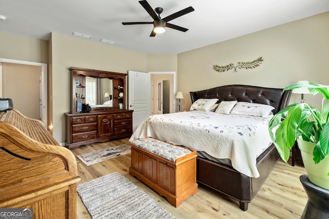 733 Firefly Ct, Griffin, GA 30223 - bedroom featuring light wood-style flooring and ceiling fan