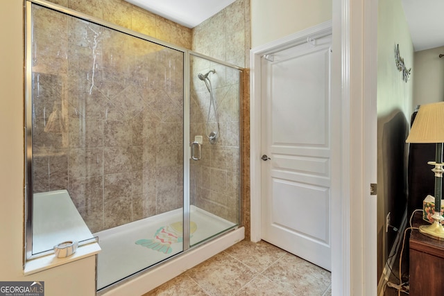 733 Firefly Ct, Griffin, GA 30223 - full bathroom with a shower stall and tile patterned floors