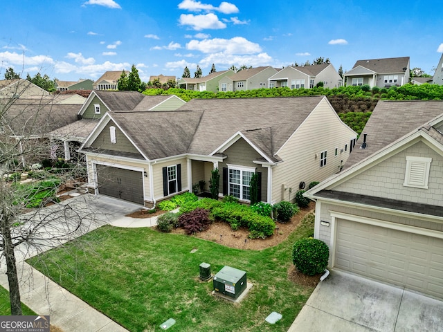 733 Firefly Ct, Griffin, GA 30223 - view of front facade with concrete driveway, a residential view, a front yard, and a garage