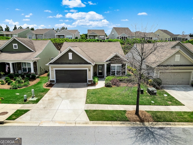 733 Firefly Ct, Griffin, GA 30223 - view of front of home featuring a residential view, concrete driveway, and an attached garage