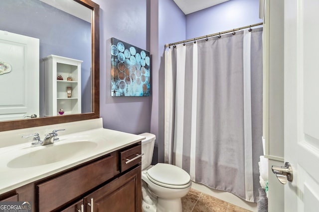 733 Firefly Ct, Griffin, GA 30223 - bathroom featuring vanity, toilet, a shower with shower curtain, and tile patterned floors