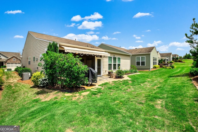 733 Firefly Ct, Griffin, GA 30223 - back of property with a lawn and cooling unit