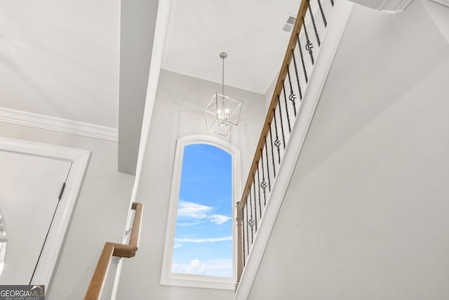 3298 Alcovy Club Ct, Dacula, GA 30019 - detailed view of crown molding and a chandelier