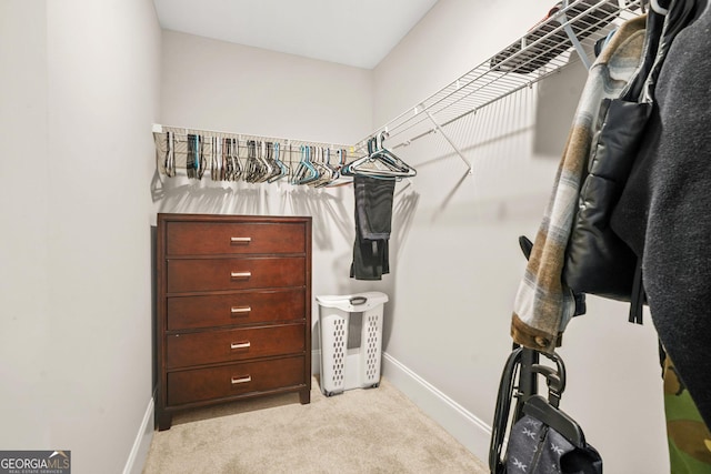 3298 Alcovy Club Ct, Dacula, GA 30019 - walk in closet featuring carpet floors