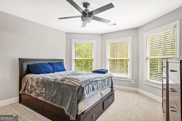 3298 Alcovy Club Ct, Dacula, GA 30019 - bedroom featuring baseboards, light carpet, and ceiling fan