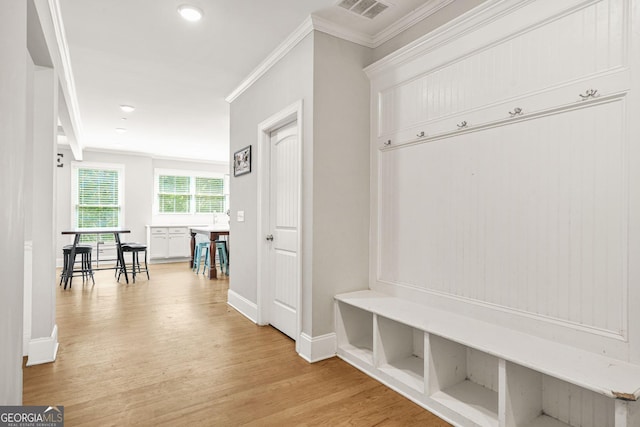 3298 Alcovy Club Ct, Dacula, GA 30019 - mudroom with ornamental molding, light wood-style flooring, and baseboards