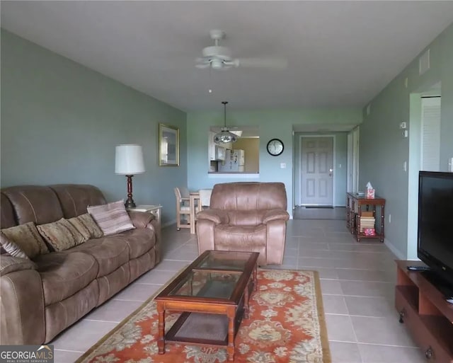 26461 Explorer Rd Unit A, Punta Gorda, FL 33983 - living area with ceiling fan and tile patterned flooring