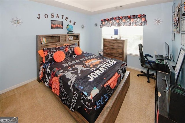 bedroom featuring carpet and baseboards