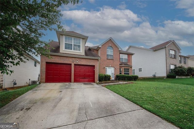 traditional-style house with brick siding, a front yard, concrete driveway, and a garage