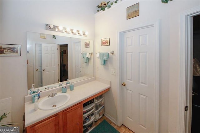 bathroom featuring vanity and tile patterned flooring