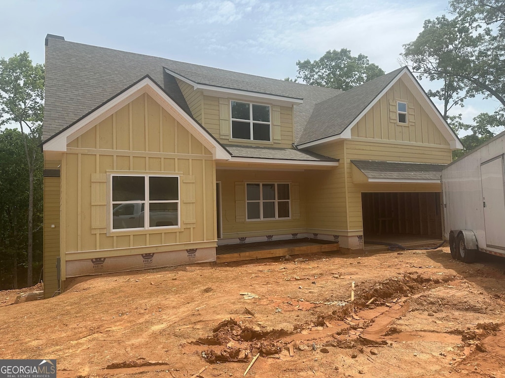 0 Shadybrook Path Lot 29, Newnan, GA 30263 - view of front facade with board and batten siding, roof with shingles, and crawl space
