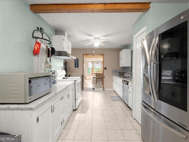 665 Mcclain Mountain Rd, Jasper, GA 30143 - kitchen with appliances with stainless steel finishes, light tile patterned flooring, white cabinetry, light countertops, and a ceiling fan