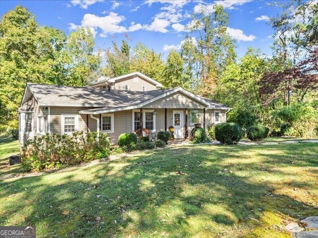 665 Mcclain Mountain Rd, Jasper, GA 30143 - view of front facade with a front lawn and a porch