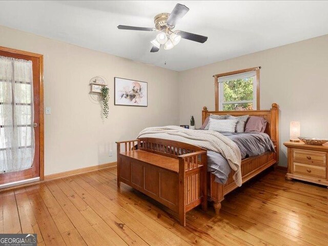 665 Mcclain Mountain Rd, Jasper, GA 30143 - bedroom with light wood-style floors and a ceiling fan