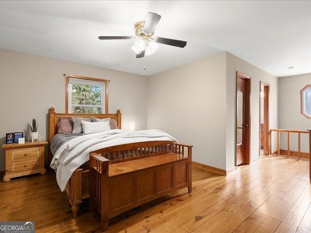 665 Mcclain Mountain Rd, Jasper, GA 30143 - bedroom featuring light wood finished floors and ceiling fan