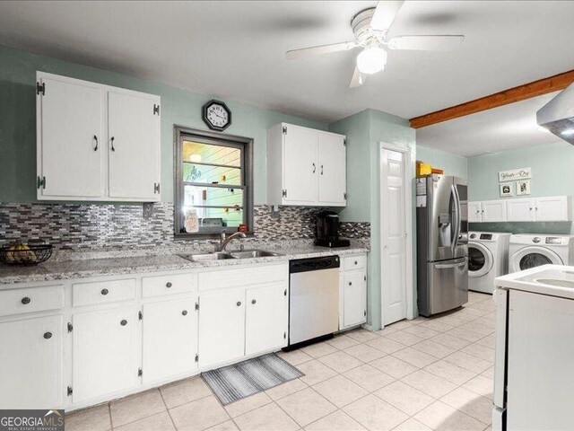 665 Mcclain Mountain Rd, Jasper, GA 30143 - kitchen featuring stainless steel appliances, washing machine and clothes dryer, backsplash, ceiling fan, and white cabinets