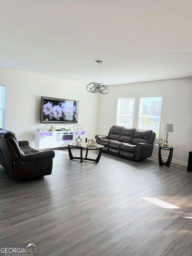 189 Bentwater Way, Hoschton, GA 30548 - living area with plenty of natural light and wood finished floors