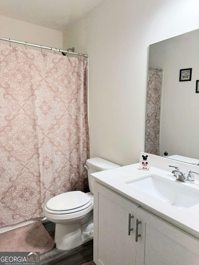 189 Bentwater Way, Hoschton, GA 30548 - full bathroom featuring vanity and wood finished floors